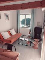Posedenie v ubytovaní Appartement avec piscine proche plages