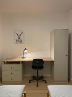 Posteľ alebo postele v izbe v ubytovaní APARTAMENTY GUZIK 22