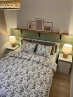 Posteľ alebo postele v izbe v ubytovaní APARTAMENTY GUZIK 22