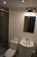 Kúpeľňa v ubytovaní Apartament Zielony Legionów 90