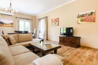TV a/nebo společenská místnost v ubytování Casa Bianca