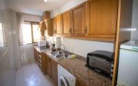 A kitchen or kitchenette at Primera línea Playa Cargador - Playamar 1121 - ALBERT VILLAS