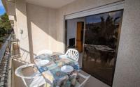 A balcony or terrace at Primera línea Playa Cargador - Playamar 1121 - ALBERT VILLAS