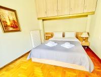 Posteľ alebo postele v izbe v ubytovaní Neoclassical 2Bed in Kallimarmaro
