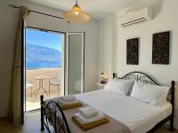 Posteľ alebo postele v izbe v ubytovaní Villa Eros Spartia Kefalonia