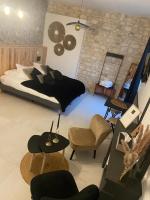 Posteľ alebo postele v izbe v ubytovaní LES LODGES DU QUEREUX