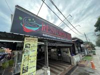 Et logo, certifikat, skilt eller en pris der bliver vist frem på DSH Batu Burok Beach Resort