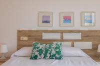 Postel nebo postele na pokoji v ubytování Apartagal-Edificio Celtas Foz