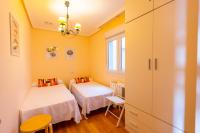 Postel nebo postele na pokoji v ubytování Apartagal-Edificio Celtas Foz