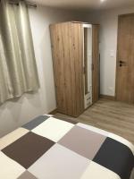 Łóżko lub łóżka w pokoju w obiekcie Paisible logement tout équipé pour 1 à 6 personnes