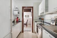 A kitchen or kitchenette at Bungalow Paraiso