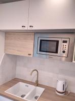 Kuchyňa alebo kuchynka v ubytovaní Résidence Graziella Appartement 222
