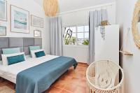 A bed or beds in a room at Stunning Villa with Breathtaking Ocean View