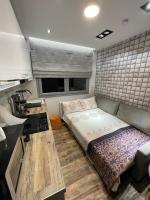 Kuchyň nebo kuchyňský kout v ubytování LA Larissa Luxury Apartments Dafne