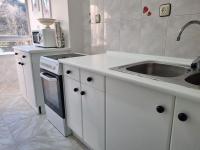 Kuchyň nebo kuchyňský kout v ubytování C09A01 Apartamento Somo