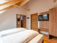 Cama o camas de una habitaci&oacute;n en Mountain Chalet Alpinchique 2