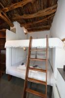 Postel nebo postele na pokoji v ubytování Giourgas Cottage Milos Island