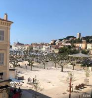 a large courtyard with trees and buildings in a city at FELIX FAURE PALAIS DES FESTIVALS CROISETTE VIEUX PORT in Cannes
