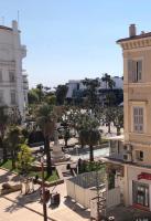 a view of a city with palm trees and buildings at FELIX FAURE PALAIS DES FESTIVALS CROISETTE VIEUX PORT in Cannes
