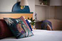 Posteľ alebo postele v izbe v ubytovaní Aramis Deluxe Rooms