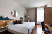 Posteľ alebo postele v izbe v ubytovaní Aramis Deluxe Rooms