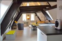 a kitchen and dining room with an attic at Bretzel &amp; Raisin - Hypercentre de Colmar in Colmar