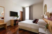Posteľ alebo postele v izbe v ubytovaní Aramis Deluxe Rooms