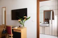 Kuchyňa alebo kuchynka v ubytovaní Aramis Deluxe Rooms