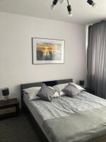 Łóżko lub łóżka w pokoju w obiekcie Apartament i pokoje Szalawa