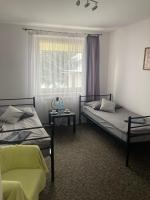 Łóżko lub łóżka w pokoju w obiekcie Apartament i pokoje Szalawa