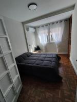 Łóżko lub łóżka w pokoju w obiekcie Céntrico apartamento inteligente