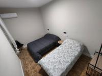 Łóżko lub łóżka w pokoju w obiekcie Céntrico apartamento inteligente