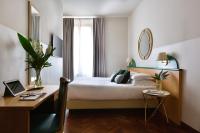 Posteľ alebo postele v izbe v ubytovaní Aramis Deluxe Rooms