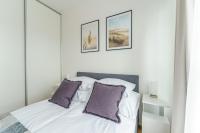 Posteľ alebo postele v izbe v ubytovaní Apartament SEAGRASS SurfingBird Dźwirzyno
