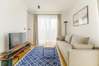 Televízia a/alebo spoločenská miestnosť v ubytovaní Apartament SEAGRASS SurfingBird Dźwirzyno