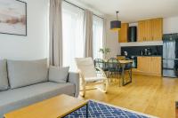 Kuchyňa alebo kuchynka v ubytovaní Apartament SEAGRASS SurfingBird Dźwirzyno