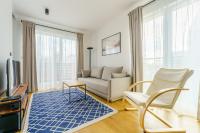 Televízia a/alebo spoločenská miestnosť v ubytovaní Apartament SEAGRASS SurfingBird Dźwirzyno