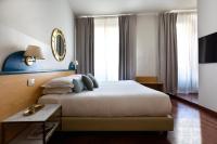 Posteľ alebo postele v izbe v ubytovaní Aramis Deluxe Rooms