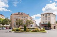 a city street with buildings and a circle in the middle at T3 rénové 10min gare Part dieu - Quartier typique in Lyon