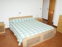A bed or beds in a room at Apartment Magnolia by Interhome