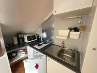 Kuchnia lub aneks kuchenny w obiekcie Appartement T2