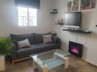 Televízia a/alebo spoločenská miestnosť v ubytovaní Belvilla by OYO Apartment El Puerto De Santa Maria