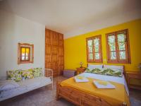 Posteľ alebo postele v izbe v ubytovaní Lemon House for big family in Damouchari - Delicious Houses