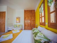 Posteľ alebo postele v izbe v ubytovaní Lemon House for big family in Damouchari - Delicious Houses