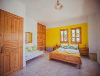Posteľ alebo postele v izbe v ubytovaní Lemon House for big family in Damouchari - Delicious Houses