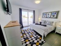 Łóżko lub łóżka w pokoju w obiekcie Luxury Villa Zen