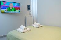 Televízia a/alebo spoločenská miestnosť v ubytovaní Nikkis Flat - Kolonaki Square