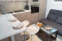 Kuchyňa alebo kuchynka v ubytovaní Nikkis Flat - Kolonaki Square