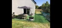 Vonkajšia záhrada v ubytovaní Chambre chez Marjorie