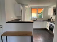 Kuchyňa alebo kuchynka v ubytovaní Magnifique appartement climatisé de 87m², à 100m de la plage